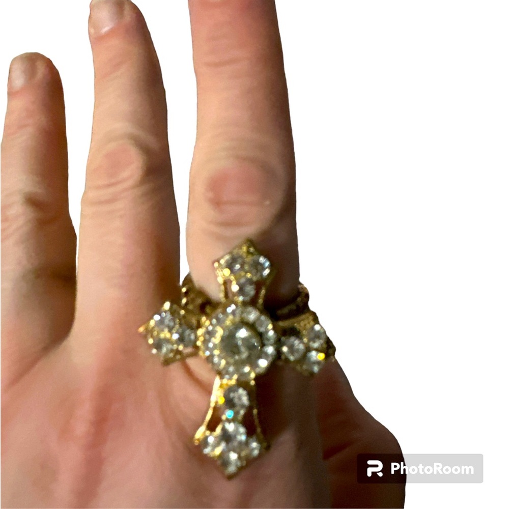 Golden diamond cross stretchable ring will fit any size finger pretty 🤩